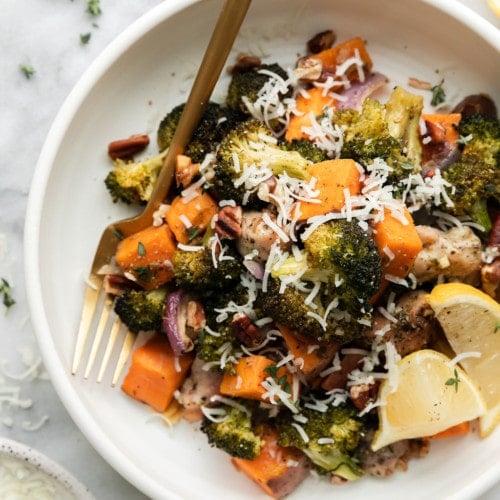 Overhead view of sweet potato broccoli chicken bake plated on a white plate.