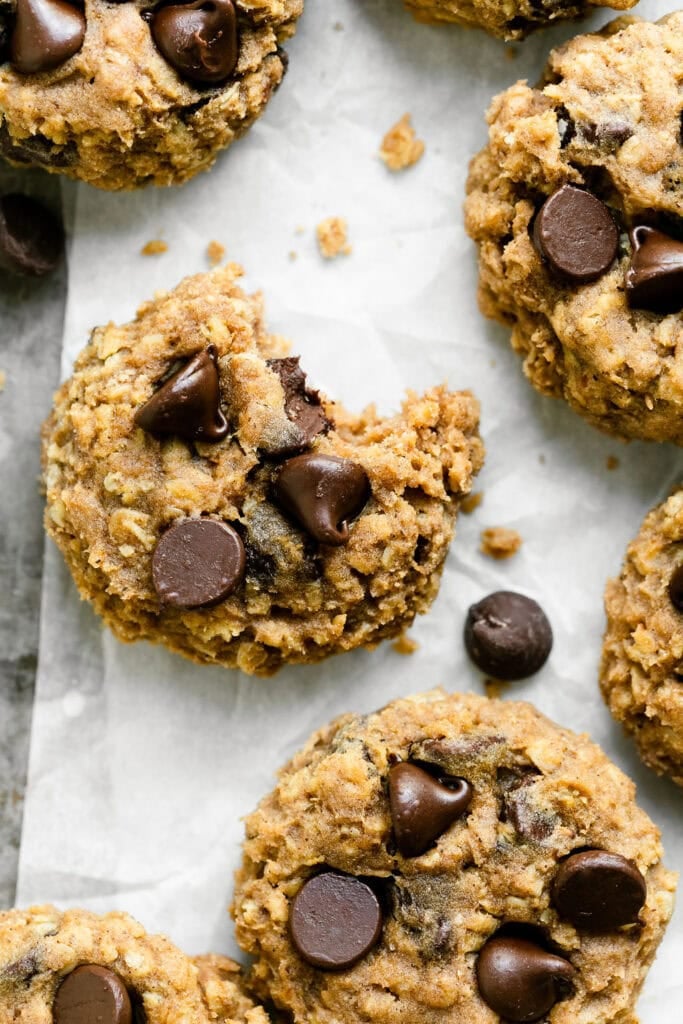 Close up of a Oatmeal Pumpkin Chocolate Chip Cookie with a bite out of it