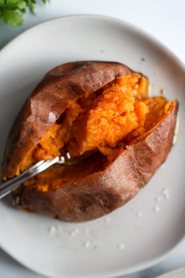 a freshly cooked Sweet Potato on a plate