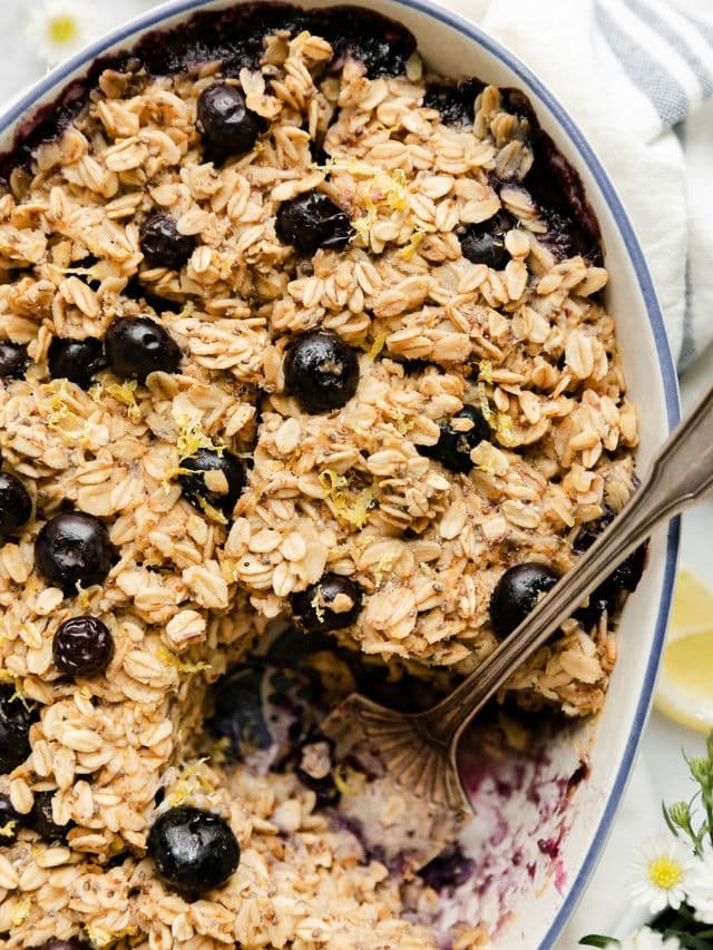 Overhead view of Lemon blueberry baked oatmeal in oval baking dish.