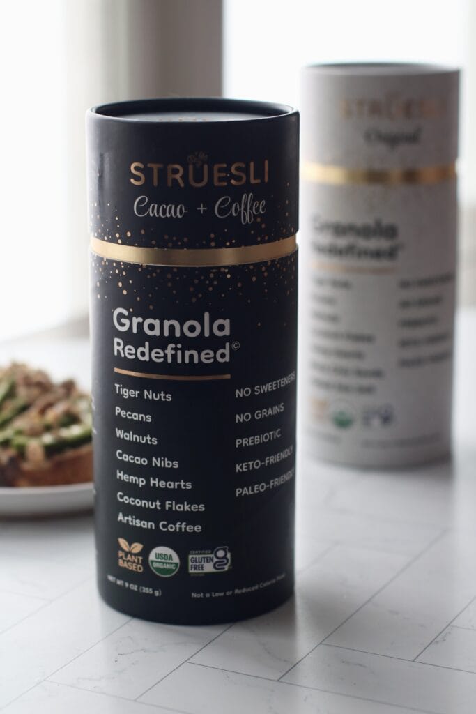 Containers of Struesli, grain-free granola against white background