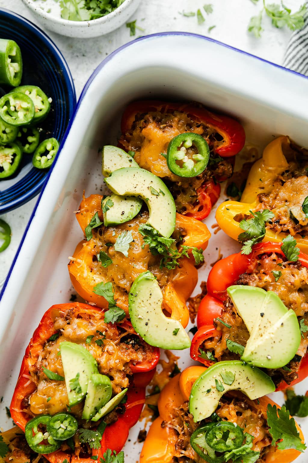 A baking dish of stuffed peppers right out of the oven.