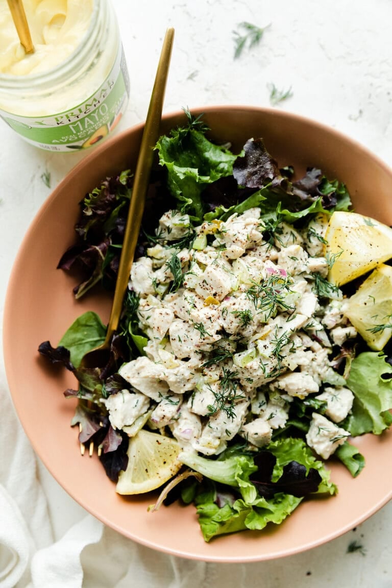 A bowl of dill pickle chicken salad, a fork sticking out.